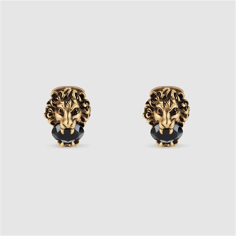 gucci lion cufflinks.